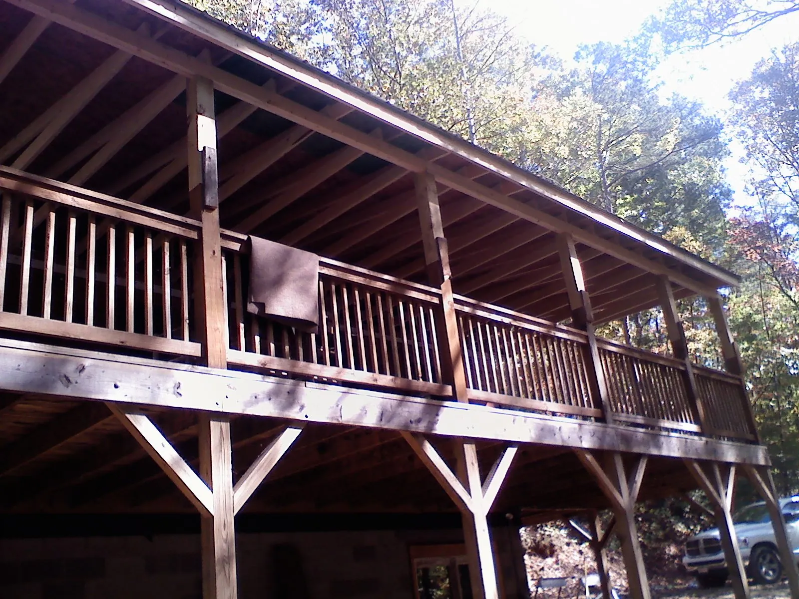 Timber framing under a new elevated porch and deck — Roof Leak Repair in Encino by Roofing Brothers